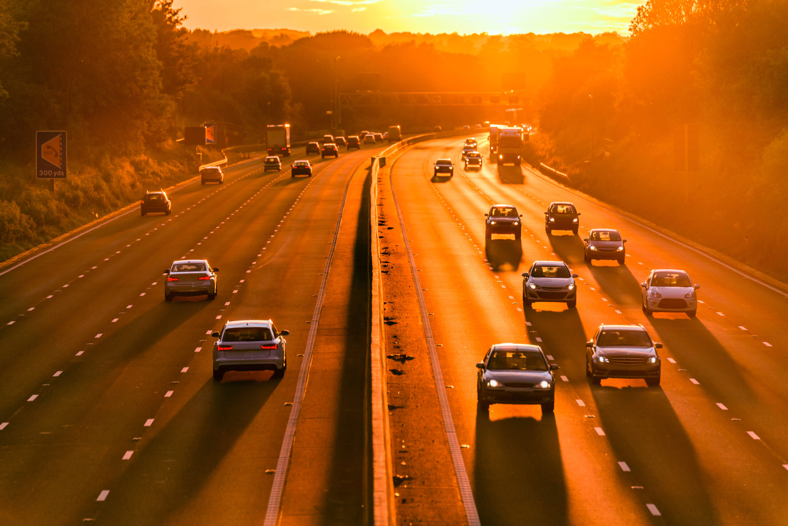 sunny motorway with cars on both sides